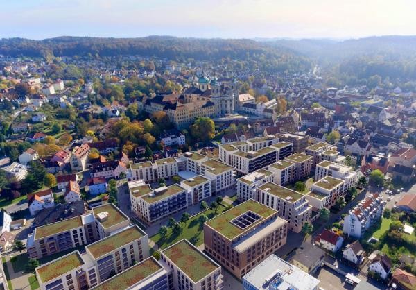 Mögliche Ansicht des Quartiers Martinshöfe: In einer Visualisierung zeigt der Bauträger die Anordnung der Gebäude. Im Hintergrund ist die Basilika zu sehen.